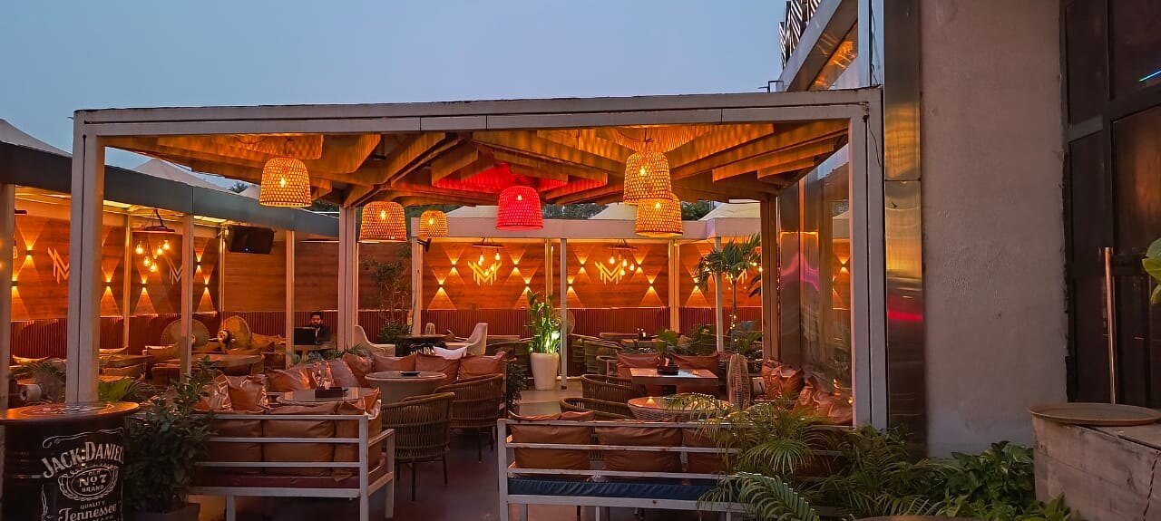 Moire courtyard dining area in the evening